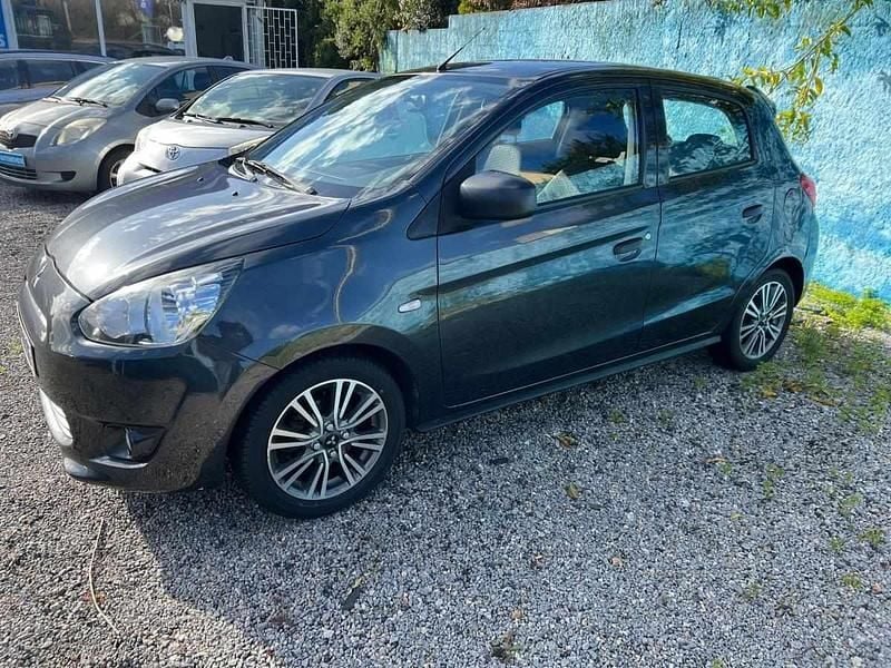 Usado Mitsubishi Space Star 71 HP (52 kW) 2013 Cinzento Citadino