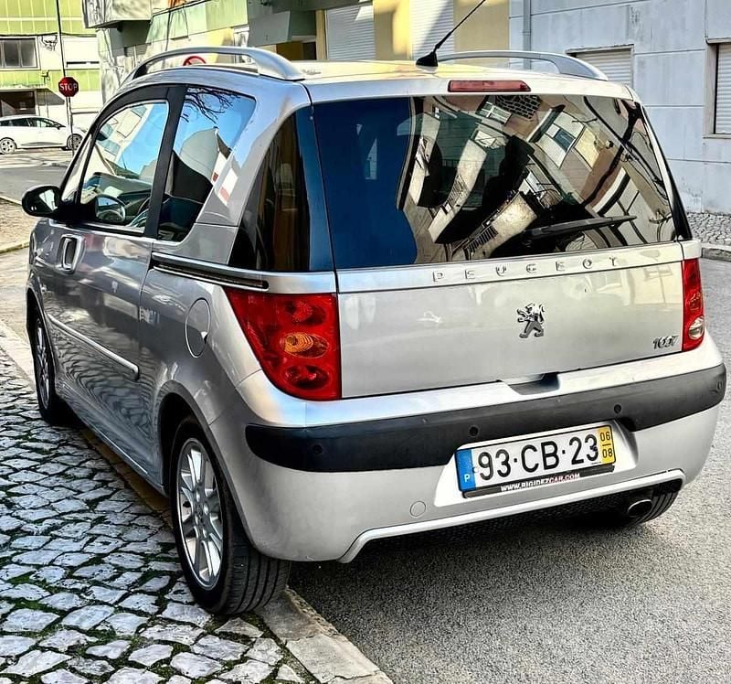 Usado Peugeot 1007 68 HP (50 kW) 2006 Cinzento Monovolume