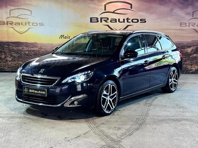 Azul escuro Usado 2015 Peugeot 308 SW Allure Carrinha | € 14.900 - Imagem 1/4