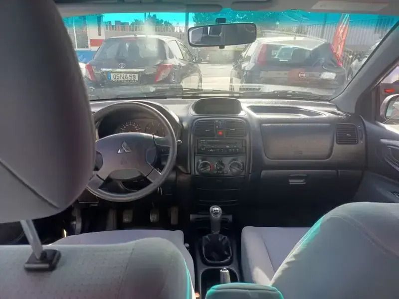 Usado Mitsubishi Space Star 110 HP (80 kW) 2003 Preto Monovolume