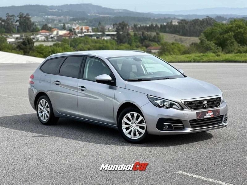 Cinzento (metalizado) Usado 2018 Peugeot 308 Style Carrinha | € 16.500 - Imagem 1/4