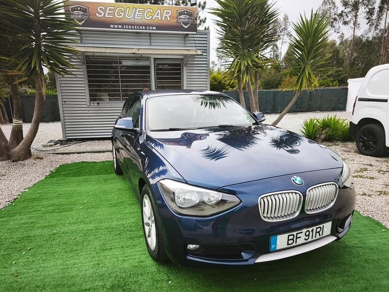 Azul Usado 2015 BMW 116 Efficient Dynamics Citadino | € 12.000 - Imagem 1/4