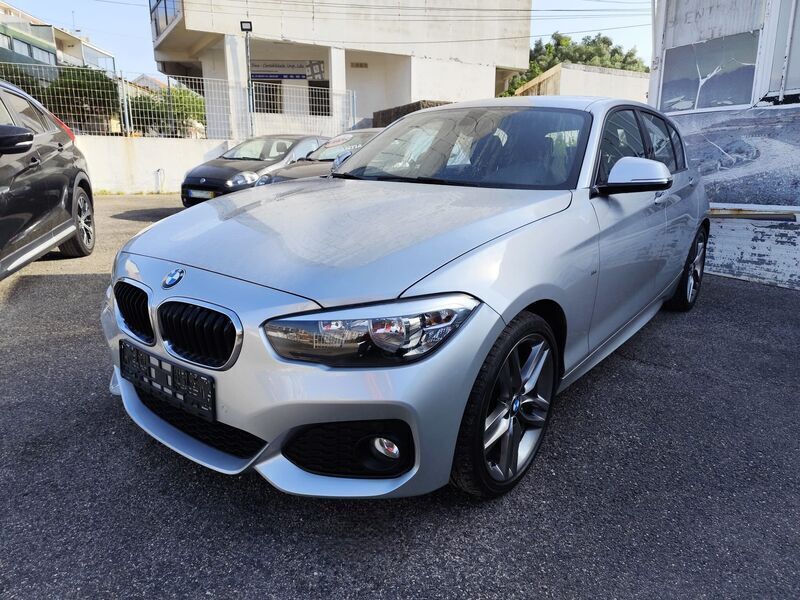 Cinza Usado 2017 BMW 120 Citadino | € 18.950 - Imagem 1/4
