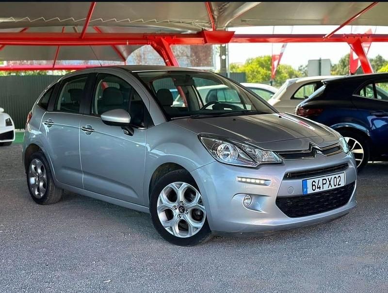 Cinza Usado 2015 Citroën C3 PureTech | € 10.950 - Imagem 1/4