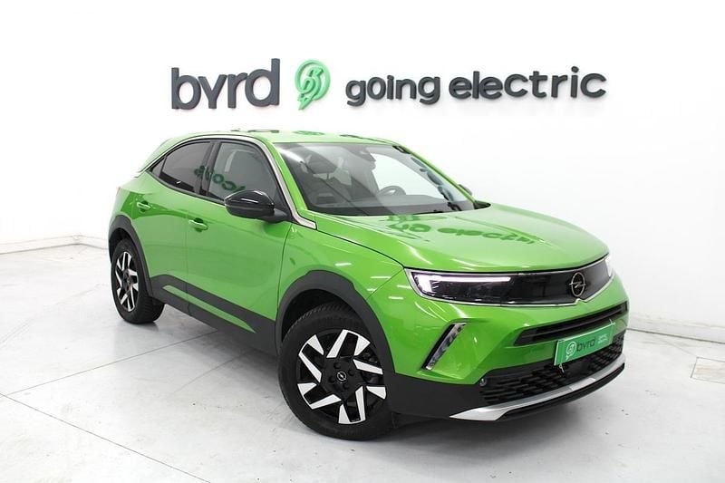 Verde Usado 2022 Opel Mokka-e Elegance SUV | € 20.900 (Preço justo) - Imagem 1/4