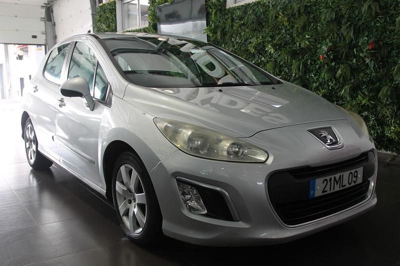 Usado Peugeot 308 92 HP (67 kW) 2011 Cinzento