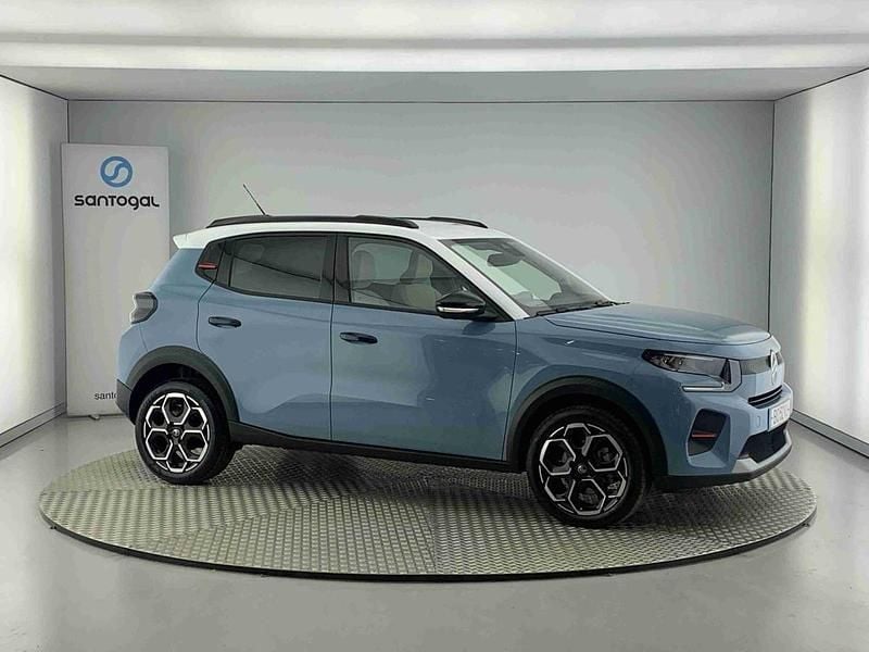 Azul Usado 2024 Citroën AX Citadino | € 19.990 - Imagem 1/4
