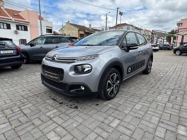 Cinza Usado 2019 Citroën C3 PureTech Citadino | € 12.500 (Preço justo) - Imagem 1/4