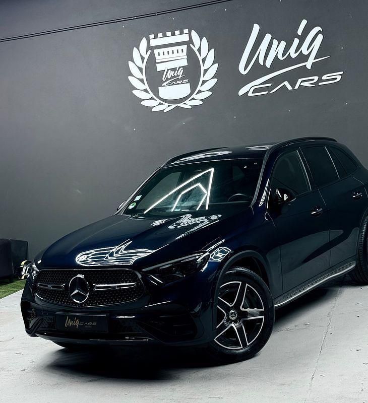 Azul Usado 2023 Mercedes GLC300 AMG line SUV | € 62.999 - Imagem 1/4