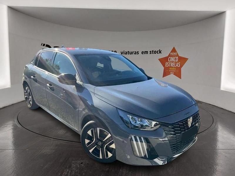 Cinzento Usado 2024 Peugeot e-208 Allure Citadino | € 21.599 (Preço justo) - Imagem 1/4