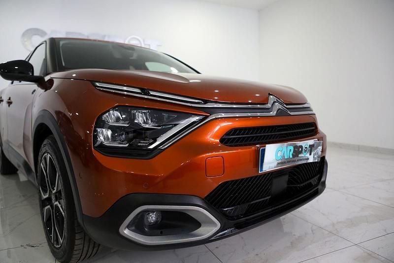 Laranja Usado 2021 Citroën e-C4 Shine | € 17.980 (Preço justo) - Imagem 1/4