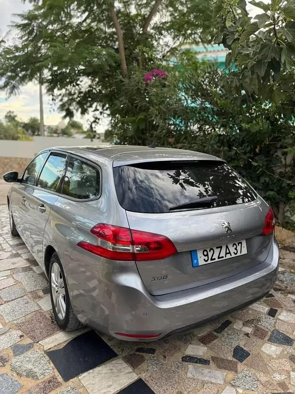 Usado Peugeot 308 SW 115 HP (84 kW) 2015 Cinzento Carrinha