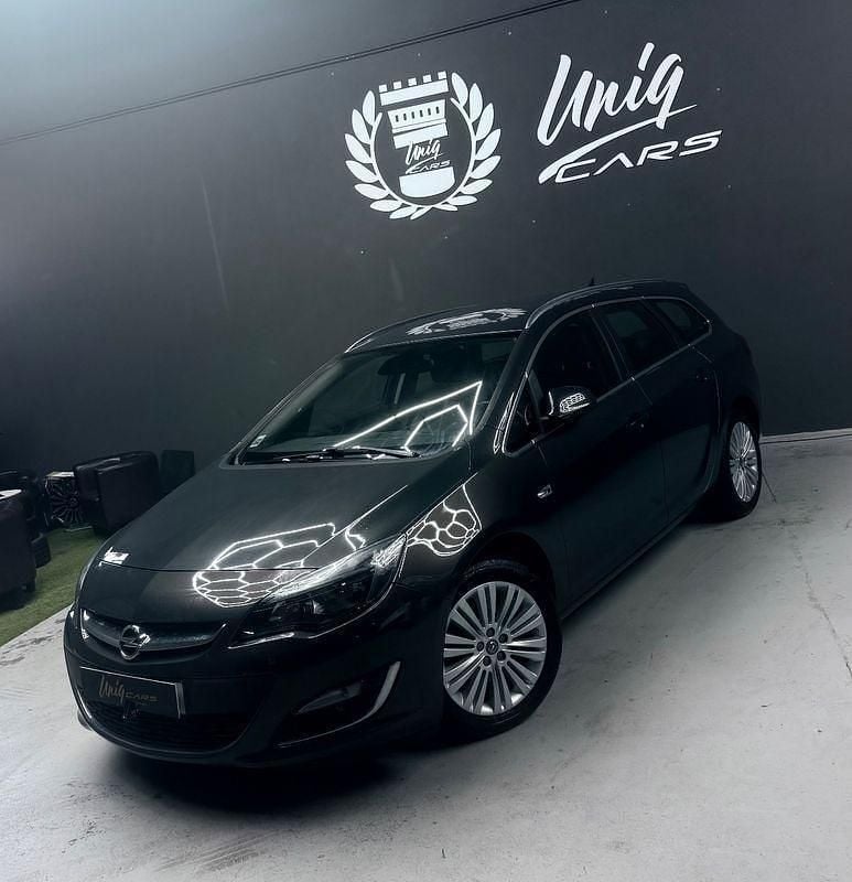 Cinza Usado 2015 Opel Astra Cosmo Carrinha | € 9.999 - Imagem 1/4