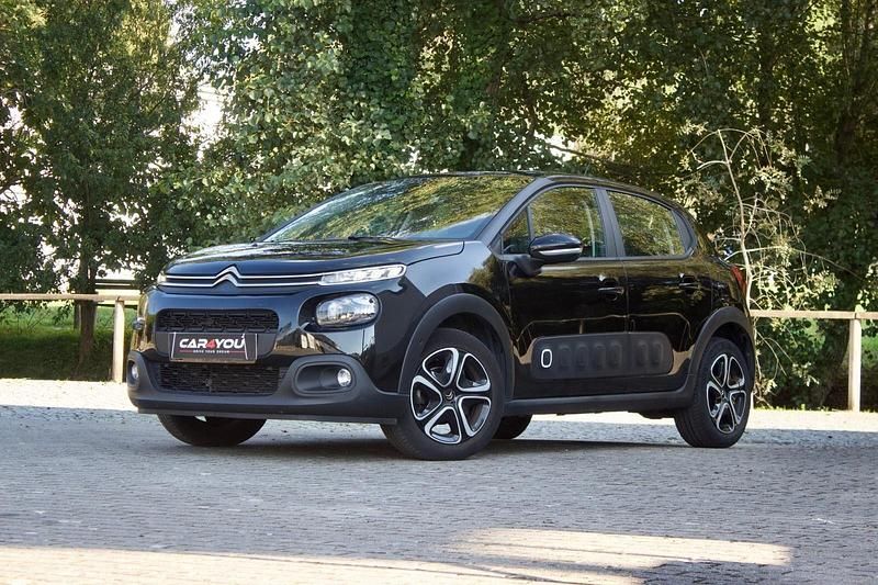 Cinza Usado 2019 Citroën C3 PureTech Citadino | € 13.790 (Preço justo) - Imagem 1/4