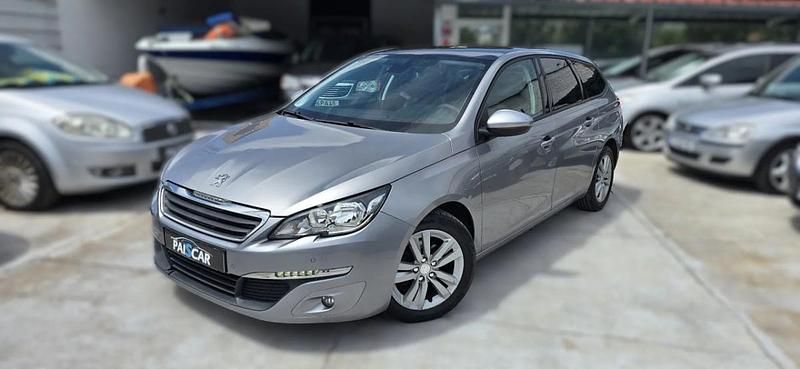 Cinzento Usado 2015 Peugeot 308 Allure Carrinha | € 8.990 (Preço justo) - Imagem 1/4