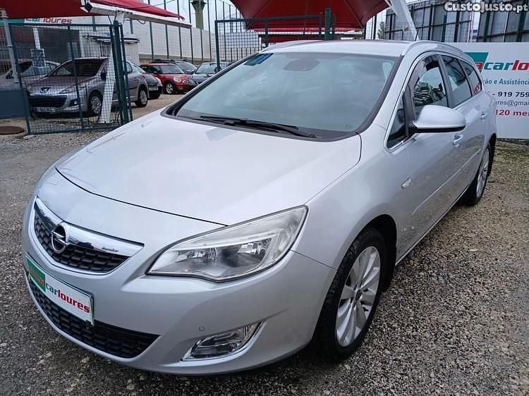 Cinza Usado 2012 Opel Astra Cosmo Sedan | € 6.850 - Imagem 1/1