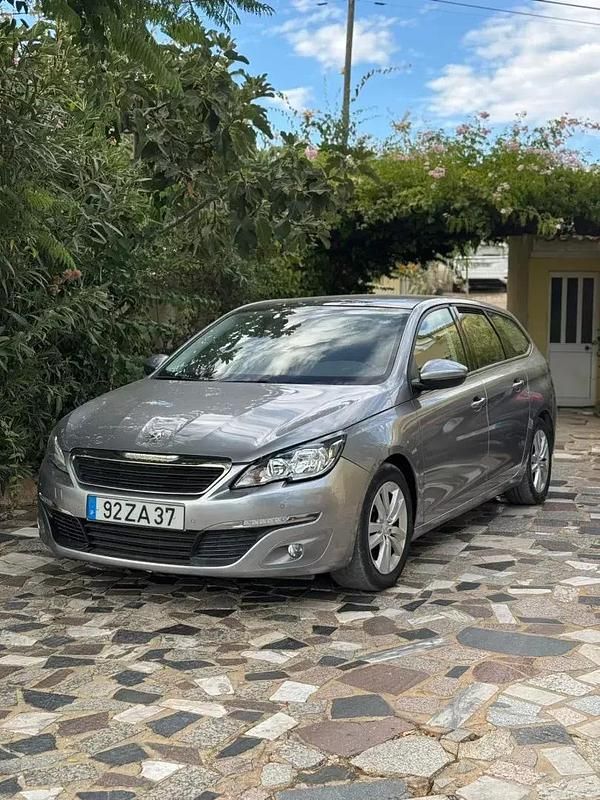 Usado Peugeot 308 SW 115 HP (84 kW) 2015 Cinzento Carrinha