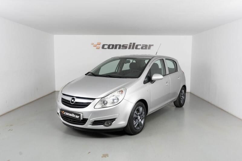 Cinza prata Usado 2010 Opel Corsa Enjoy Citadino | € 5.980 (Preço justo) - Imagem 1/4