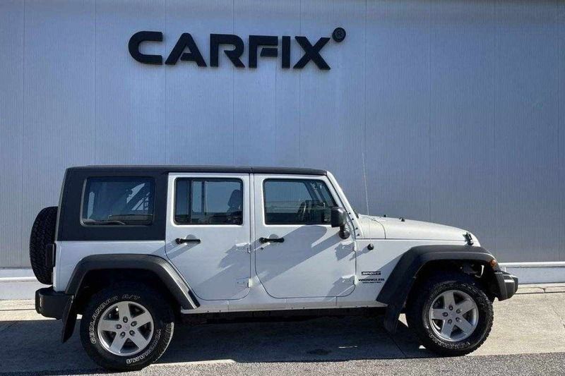 Branco Usado 2010 Jeep Wrangler SUV | € 39.999 (Caro) - Imagem 1/4