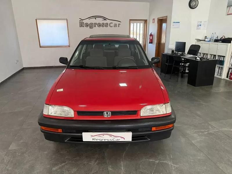 Vermelho Usado 1992 Honda Concerto | € 3.990 - Imagem 1/4