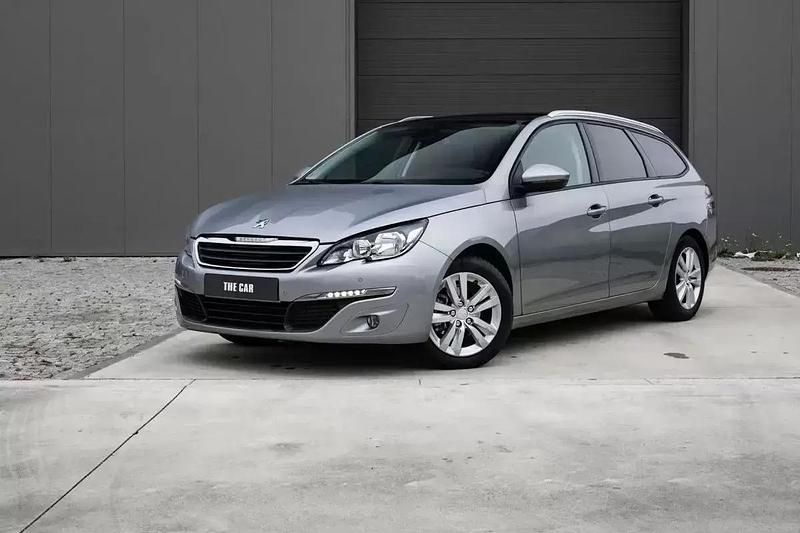 Cinzento Usado 2015 Peugeot 308 SW Allure Carrinha | € 8.999 - Imagem 1/4