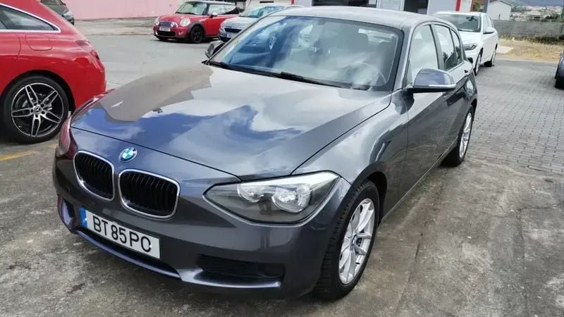 Cinza escuro Usado 2013 BMW 116 Efficient Dynamics Citadino | € 11.950 (Preço justo) - Imagem 1/4