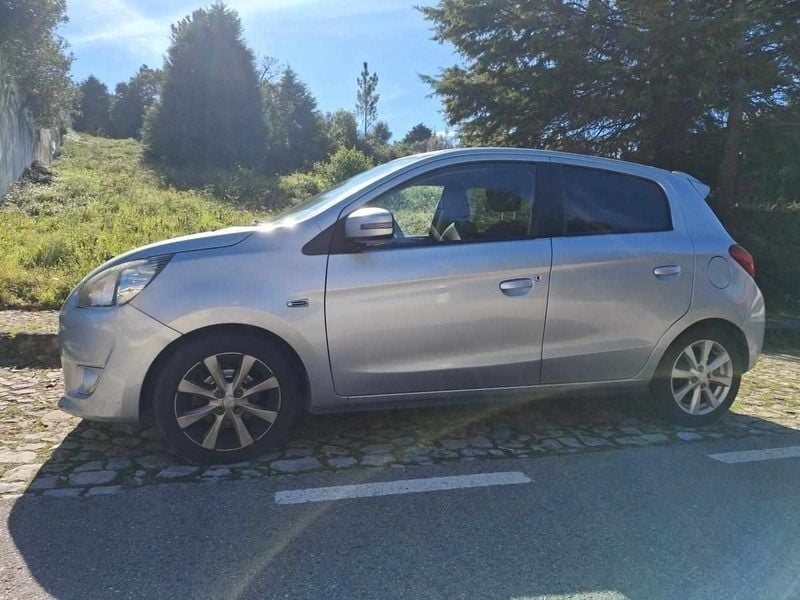 Cinzento Usado 2015 Mitsubishi Space Star | € 5.750 - Imagem 1/4