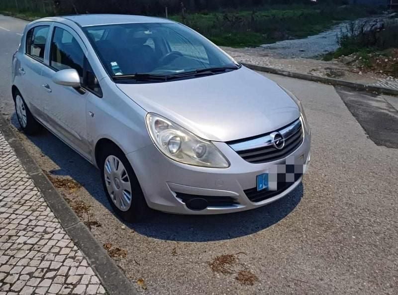Usado Opel Corsa 75 HP (55 kW) 2007 Cinzento Citadino