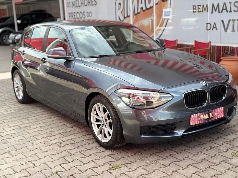 Cinza Usado 2013 BMW 116 Citadino | € 13.999 - Imagem 1/4