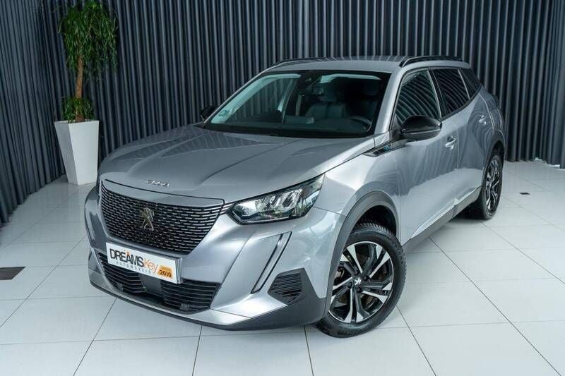 Cinzento Usado 2022 Peugeot e-2008 Allure SUV | € 20.800 (Preço justo) - Imagem 1/4