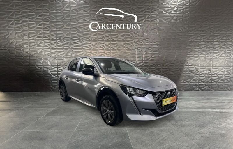Cinza Usado 2023 Peugeot e-208 Style Citadino | € 22.500 (Preço elevado) - Imagem 1/4