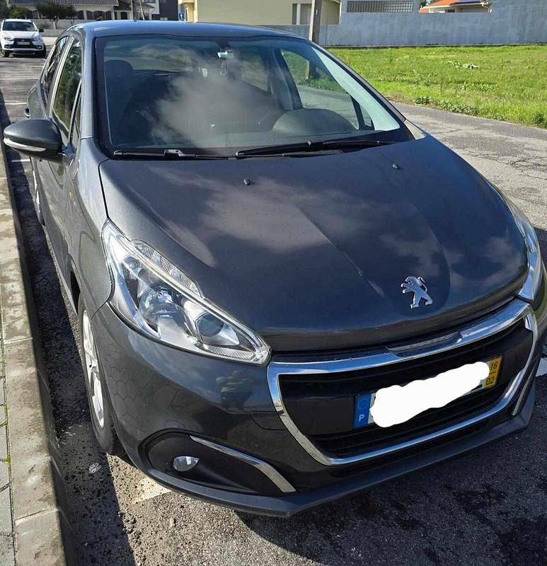 Usado Peugeot 208 75 HP (55 kW) 2016 Cinzento Citadino