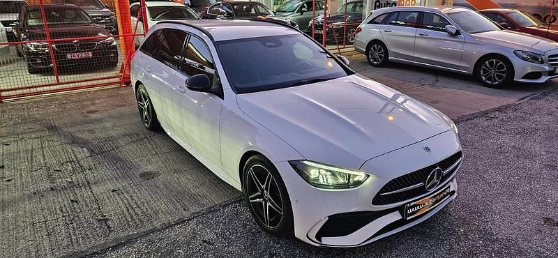 Usado Mercedes C300 AMG line 265 HP (194 kW) 2023 Branco Carrinha