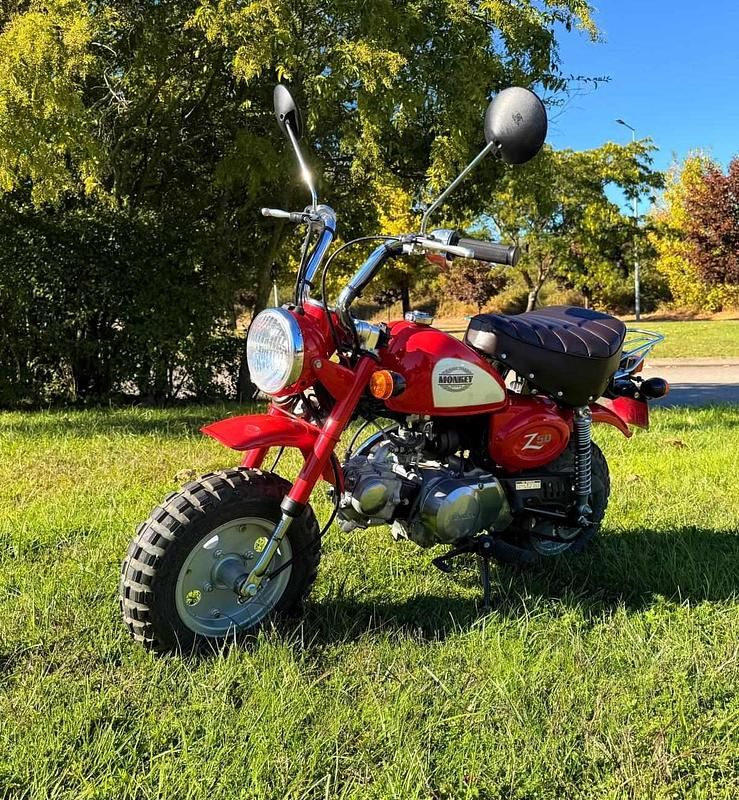 Vermelho Usado 2008 Honda Z Citadino | € 6.500 - Imagem 1/4