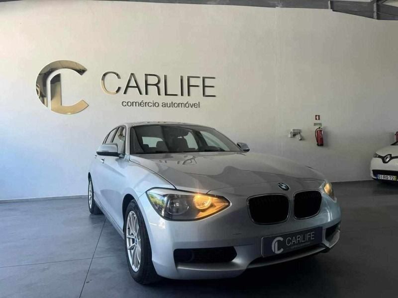 Cinzento Usado 2013 BMW 116 Citadino | € 11.990 (Preço justo) - Imagem 1/4