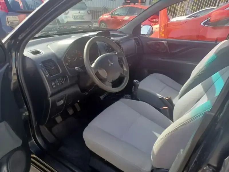 Usado Mitsubishi Space Star 110 HP (80 kW) 2003 Preto Monovolume