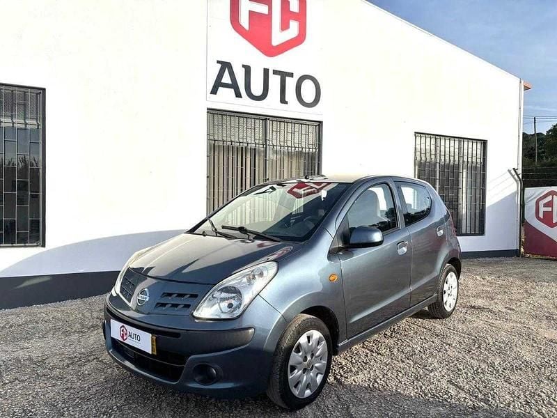 Cinza Usado 2010 Nissan Pixo Acenta Citadino | € 4.750 - Imagem 1/4