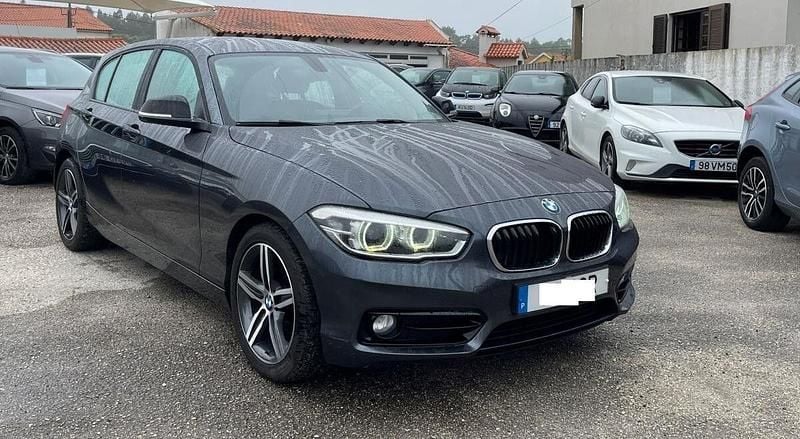 Cinza Usado 2016 BMW 116 Sport Line Citadino | € 14.990 - Imagem 1/4