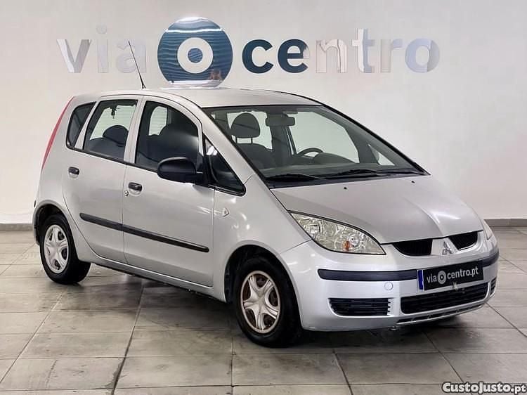 Cinza Usado 2007 Mitsubishi Colt Inform Citadino | € 3.250 - Imagem 1/1