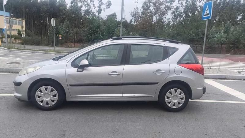 Cinzento Usado 2007 Peugeot 207 Carrinha | € 4.000 - Imagem 1/4