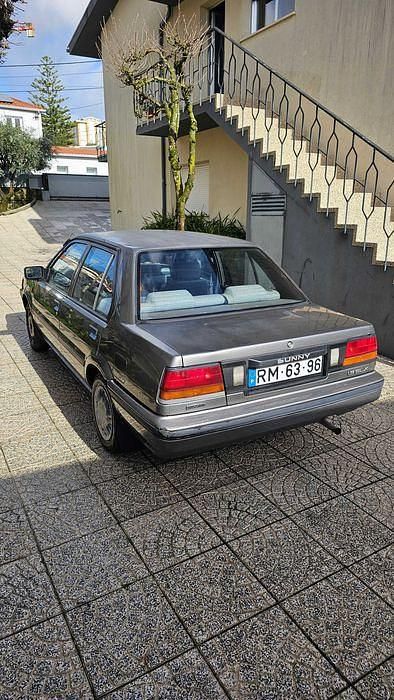 Usado Nissan Sunny 60 HP (44 kW) 1987 Cinzento Sedan