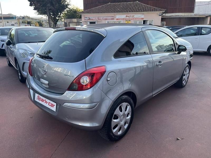 Usado Opel Corsa 80 HP (58 kW) 2010 Cinzento Citadino