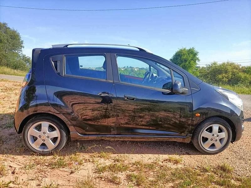 Usado Chevrolet Spark 81 HP (59 kW) 2011 Preto Citadino