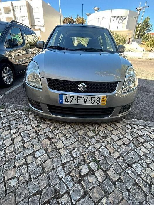 Cinzento Usado 2008 Suzuki Swift Sedan | € 4.950 (Bom preço) - Imagem 1/4