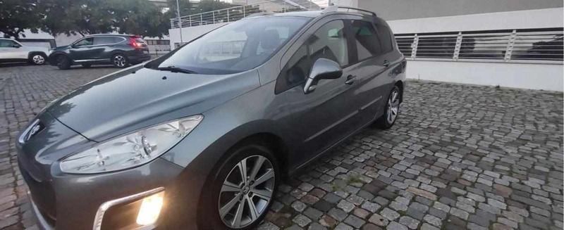 Cinzento Usado 2011 Peugeot 308 Sportium Carrinha | € 6.599 (Preço justo) - Imagem 1/4