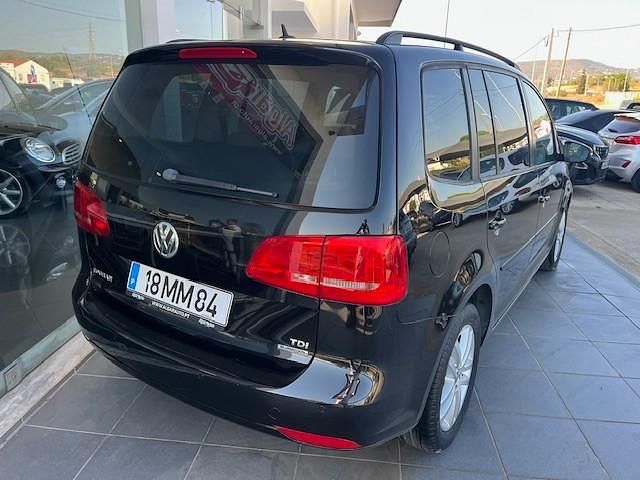 Usado VW Touran 105 HP (77 kW) 2011 Preto Monovolume