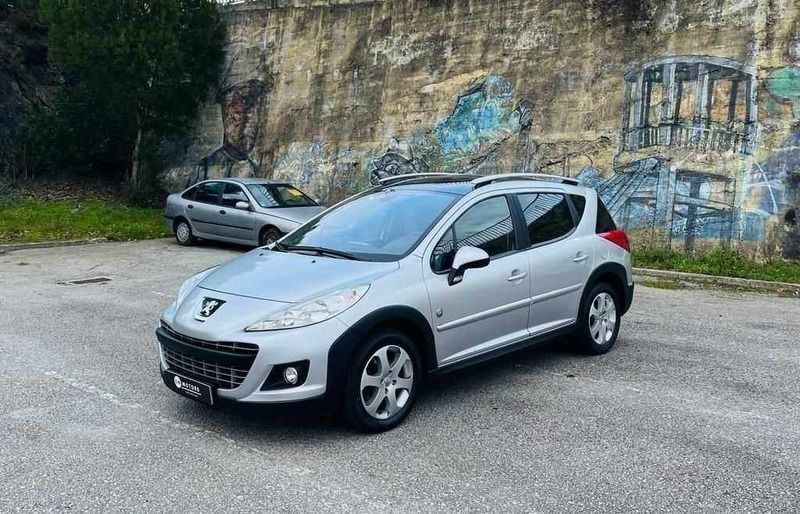 Outra (metalizado) Usado 2009 Peugeot 207 Outdoor Outdoor Carrinha | € 8.750 - Imagem 1/4