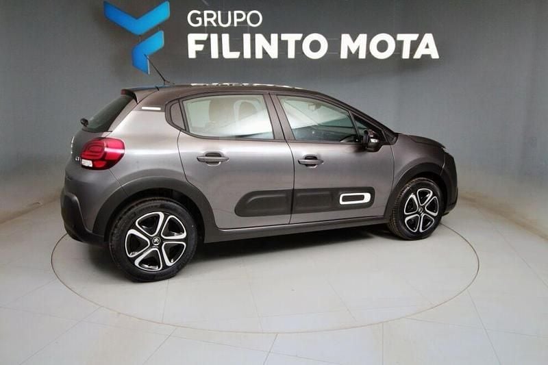 Cinza Usado 2022 Citroën C3 PureTech Citadino | € 12.680 (Preço justo) - Imagem 1/4