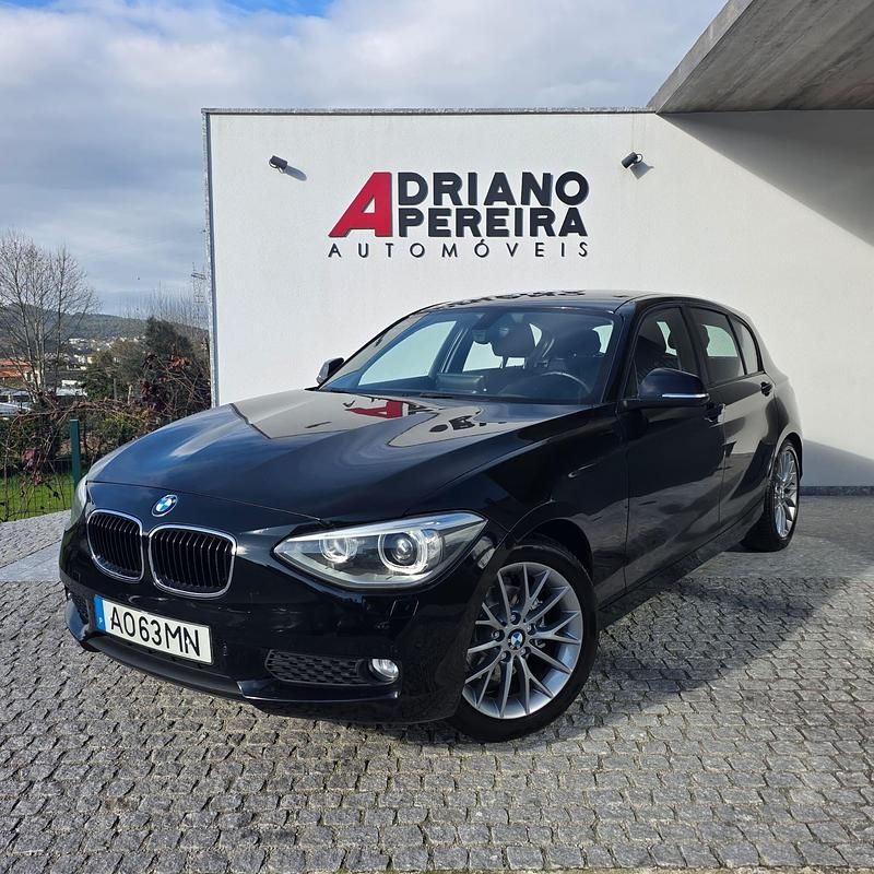 Preto Usado 2012 BMW 116 Urban Line Citadino | € 11.900 (Preço justo) - Imagem 1/4