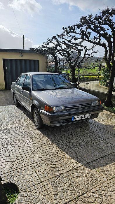 Usado Nissan Sunny 60 HP (44 kW) 1987 Cinzento Sedan